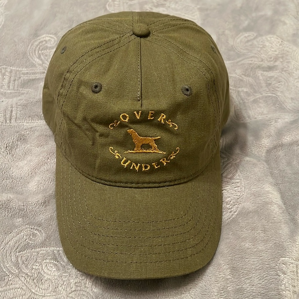 New mens OVER UNDER adjustable hat.NWOT